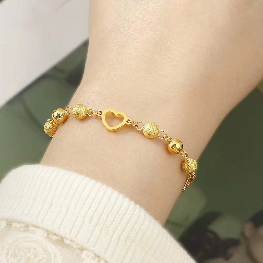 Sweet Hollow Heart Bracelet – Elegant Gold-Tone Love Charm for Women & Girls