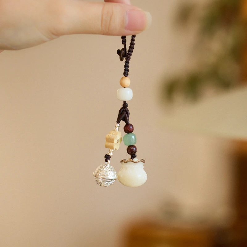 The Abundance Seed" White Jade Bodhi Money Bag Keychain | Natural Zen Botanical Charm with Prosperity Bell | Creative Car & Bag Ornament | Manifestation & Wealth Retention Talisman